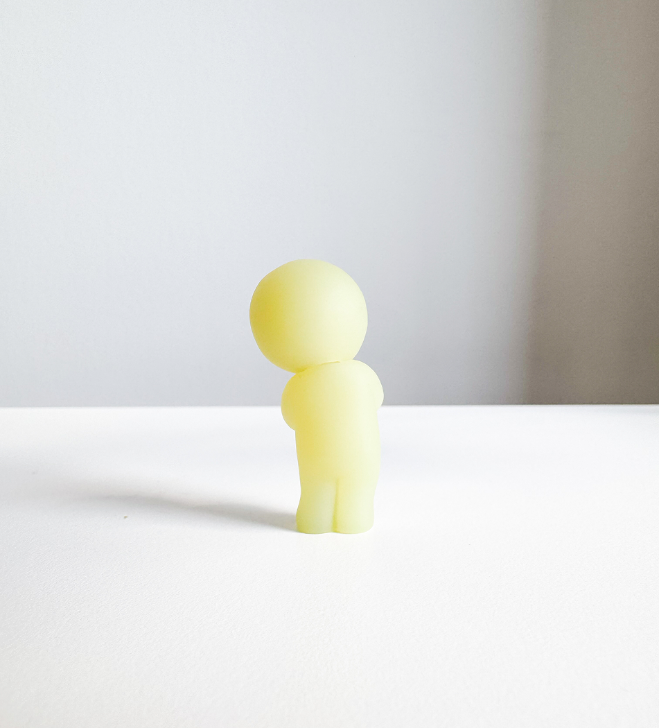 Image of the back view of the smiski figurine