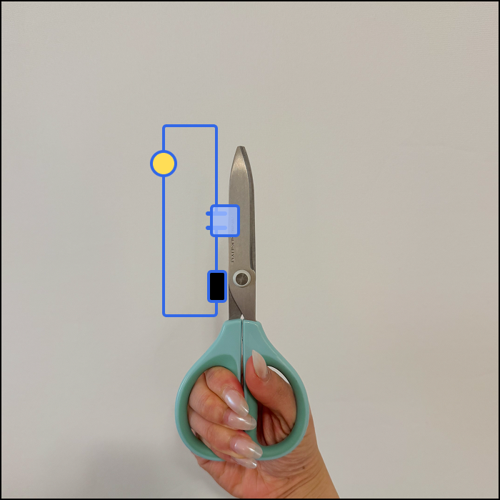 This is an example of an object based interaction, based on the scissors closing mechanism, the switch is closed when the scissors are closed.