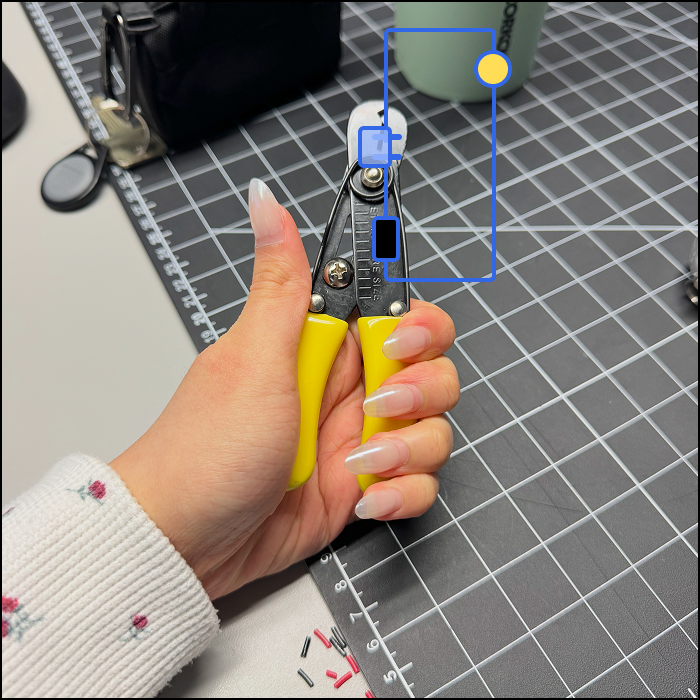 This is an example of an object based interaction, based on the plier's closing mechanism, the switch is opened when the hinge is inactive and closed when the pliers are pushed in.